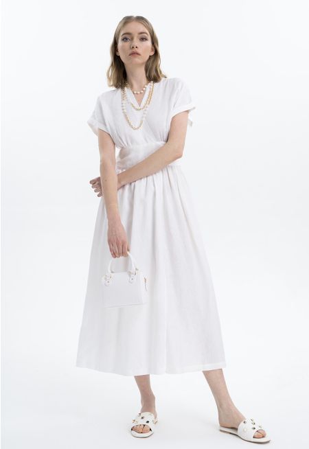 فستان كتان ماكسي بتصميم لف - ستايل رمضان- عروض